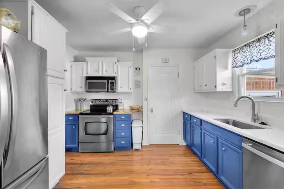 Whether you're preparing a quick breakfast or a family feast, the fully stocked kitchen has everything you need to cook and dine together, including pots and pans, cooking utensils, knives, dishes, glasses, a coffee maker, blender, toaster, and more.