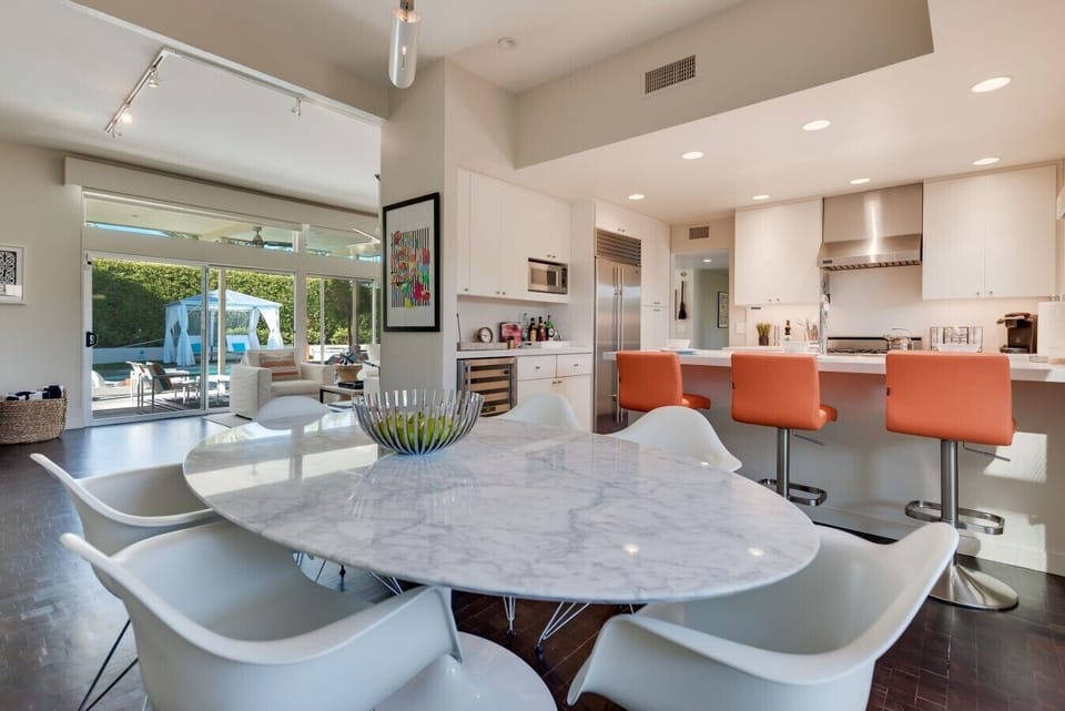 Formal Dining Room Seats Six and Is In Between Living Room And Kitchen