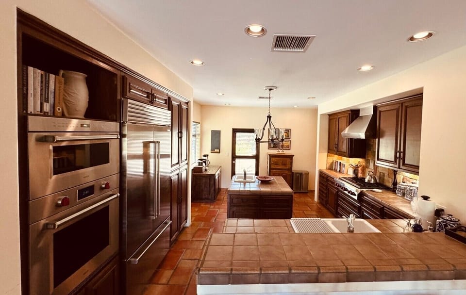 Kitchen Features Wolf Professional And Sub-Zero Appliances Including Double Oven