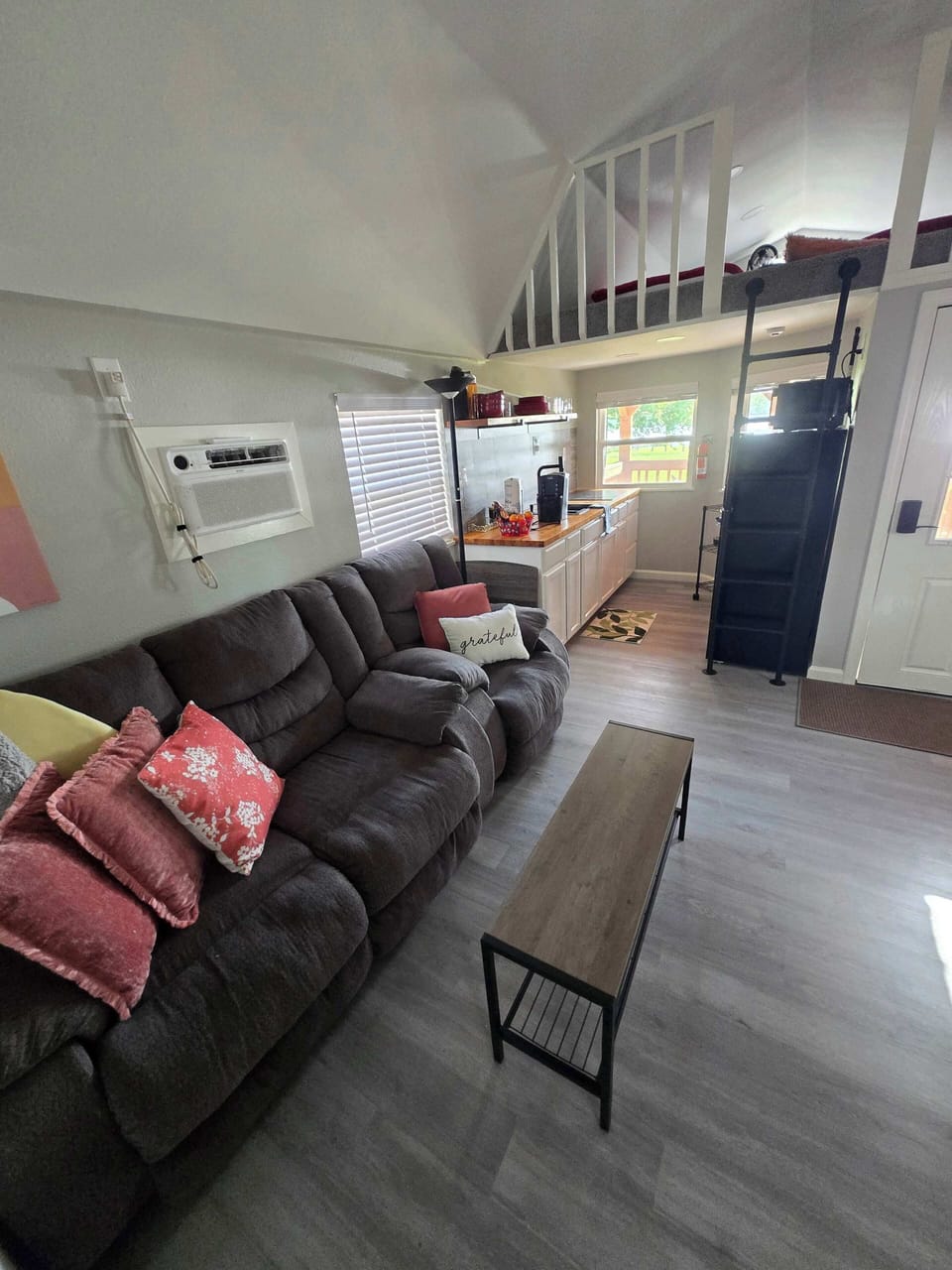 Kitchen and Livingroom/front loft as seen from bathroom/hallway