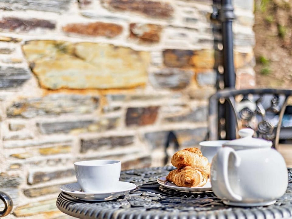 Dine al fresco while admiring the view and listening to the river