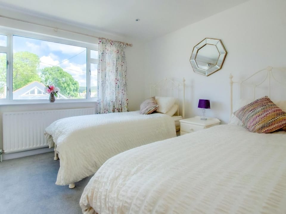 Twin bedroom decorated in calming colours