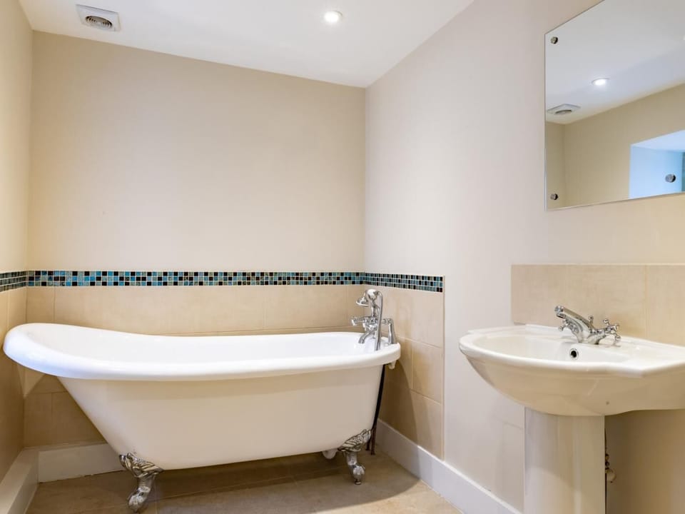 Enjoy a soak in this beautiful roll top bath