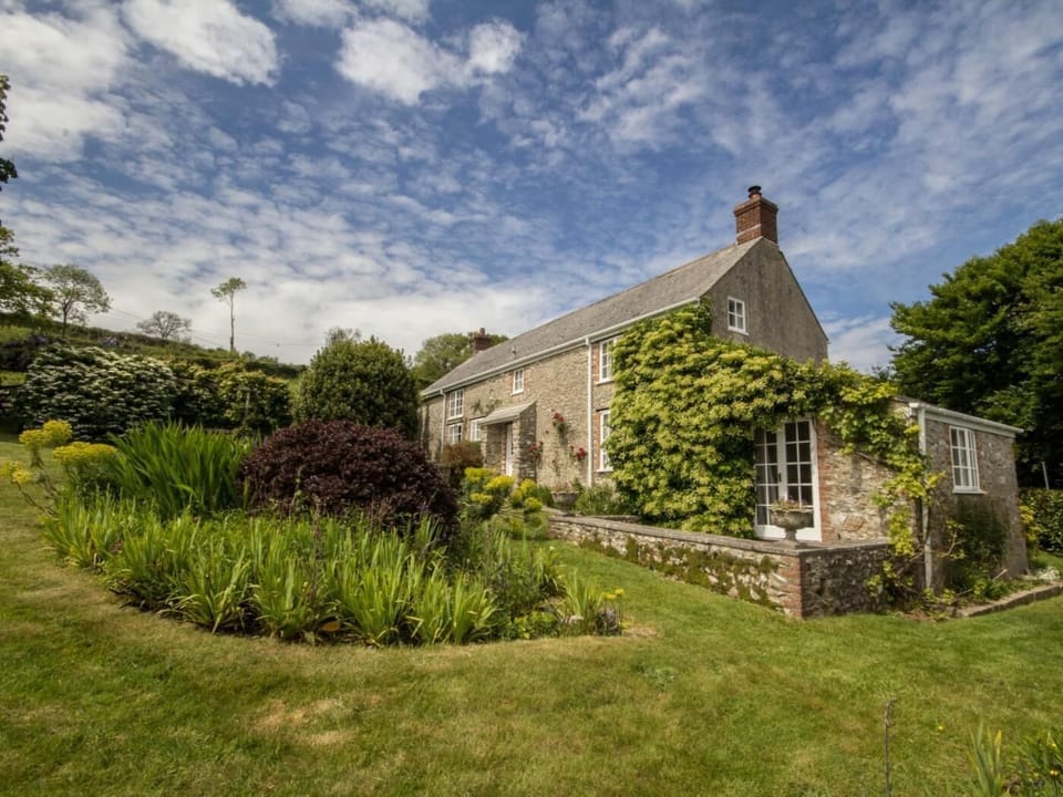 Traditional stone farmhouse elevated above stunning countryside