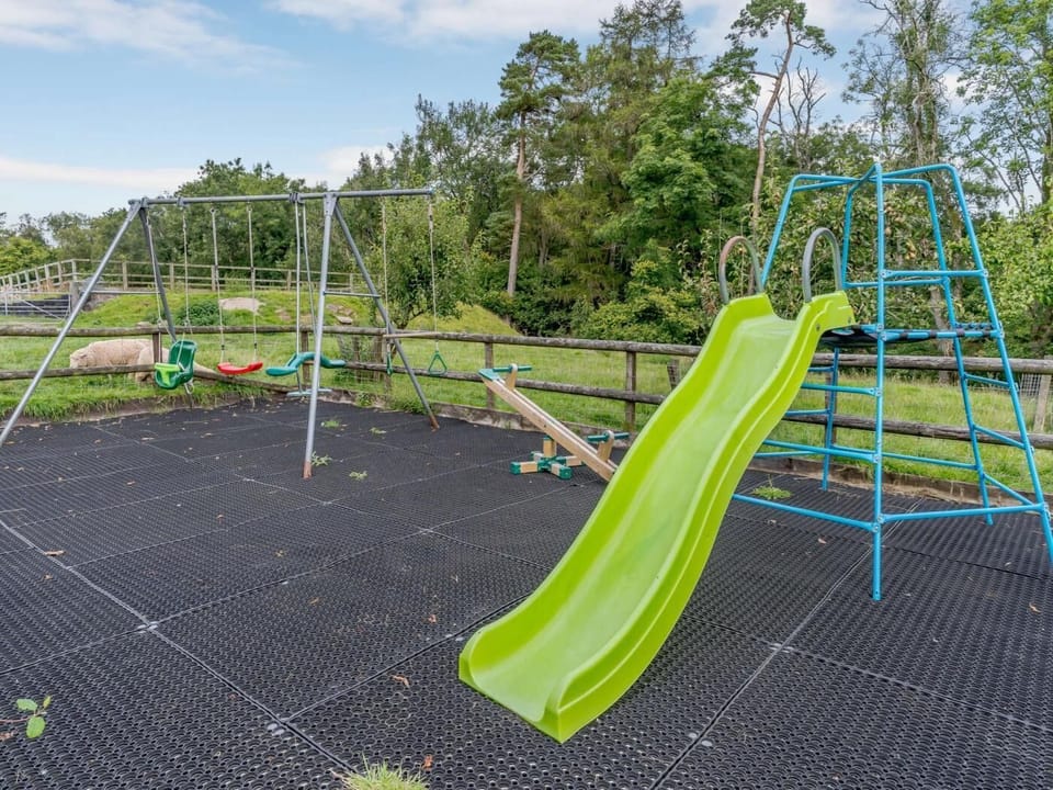 Childs play area at the back of the cottage