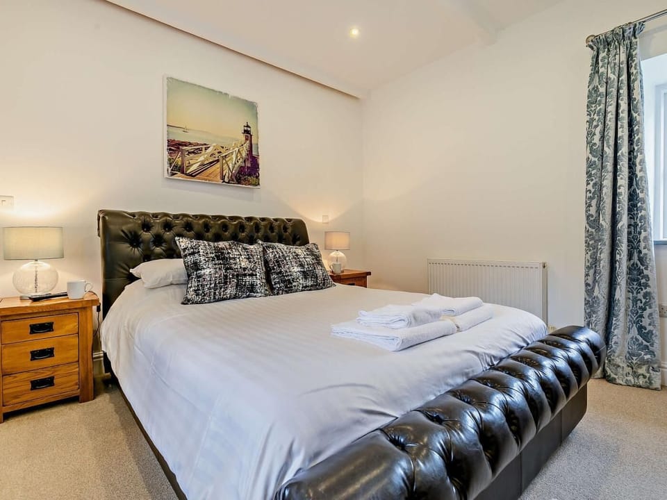 Comfortable and spacious master bedroom with king size bed