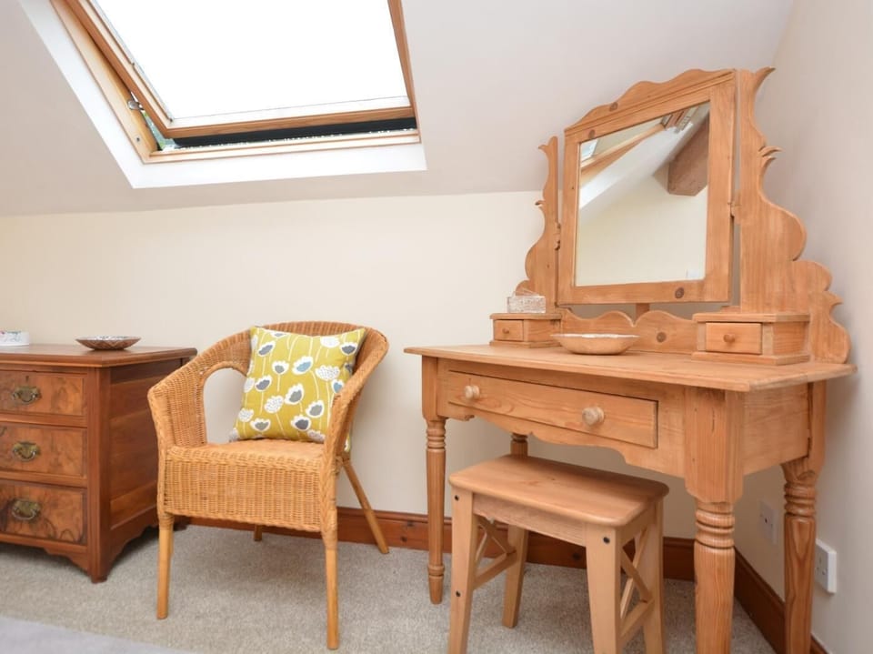 The furniture perfectly matches the cottage charm