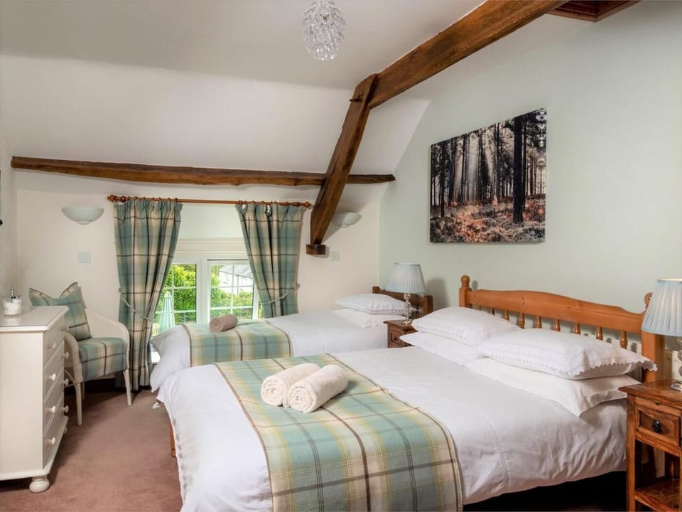 A spacious double room with additional single bed