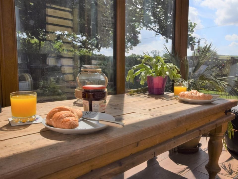 The conservatory is a great space to sit and enjoy breakfast basking in the morning sun