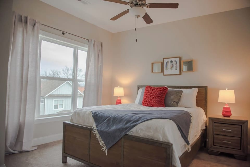 3rd floor bedroom with queen bed