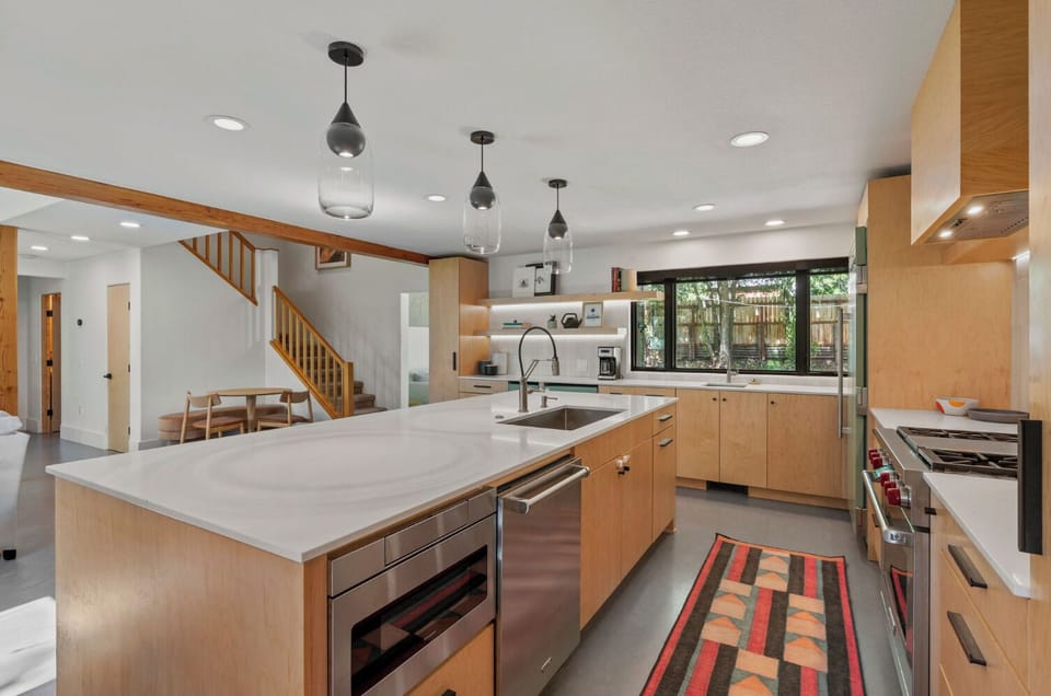 A fully equipped kitchen made for gathering
