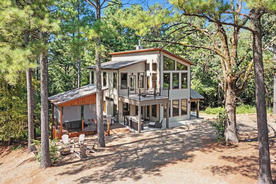 Sleek, modern cabin surrounded by nature