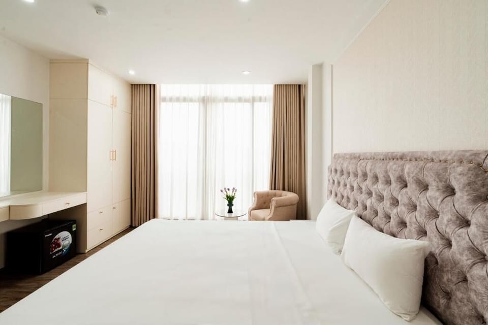 Deluxe Double Room, Balcony, City View | In-room safe, desk, laptop workspace, blackout drapes