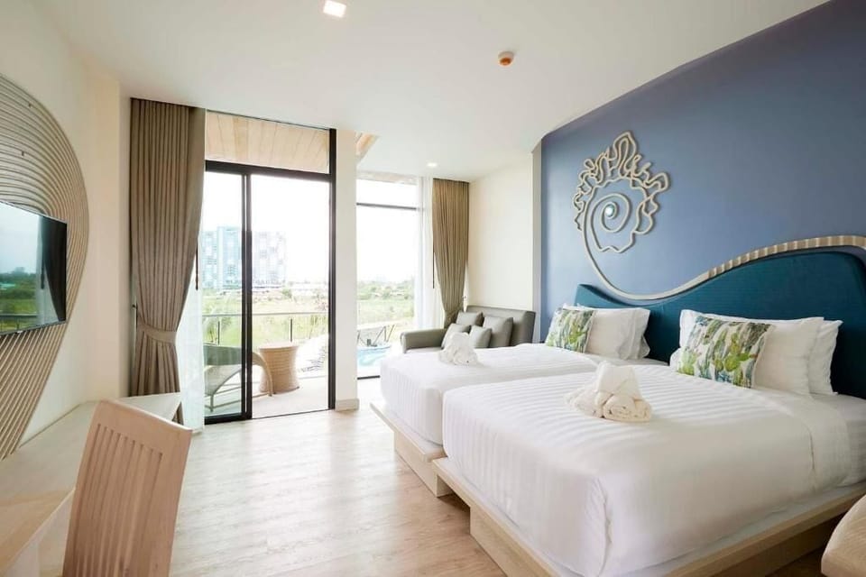 Basic Twin Room, Balcony, Pool View | In-room safe, blackout drapes, WiFi (free)