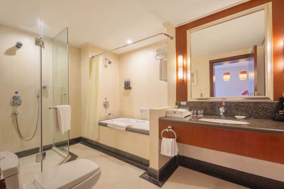 Family Suite, City View | Bathroom | Free toiletries, hair dryer, bathrobes, slippers
