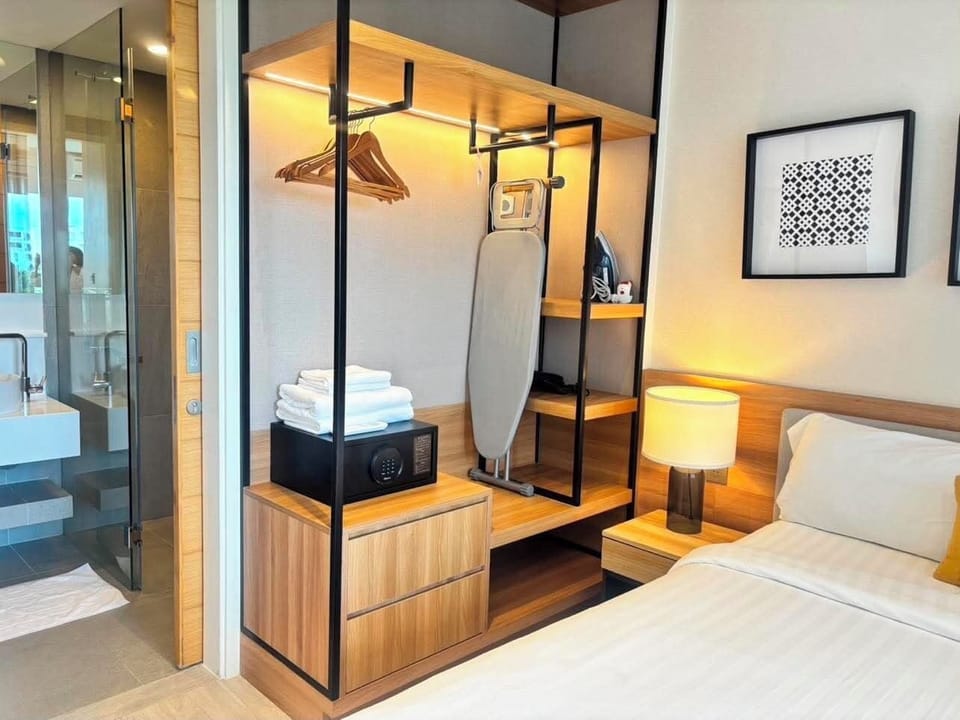 Deluxe Condo, Kitchenette, Lake View | Iron/ironing board, WiFi (free)