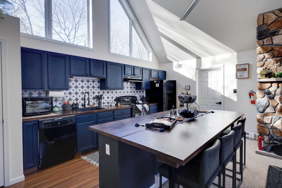 Well-equipped kitchen with large island for cooking and entertaining.