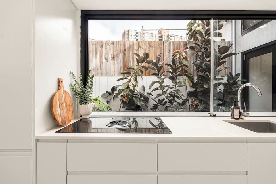 Kitchen | Cook with ease using the modern stovetop, sink and generous preparation space.