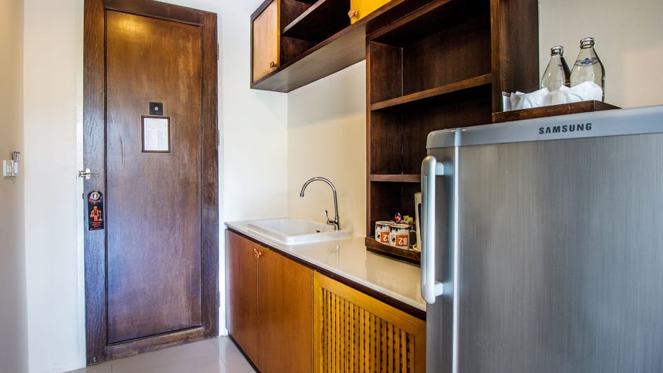 Junior Suite | Living area | 32-inch LCD TV with cable channels