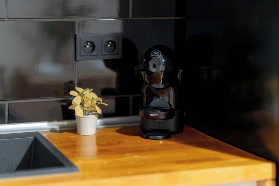 Coffee station with capsule coffee machine, perfect for your morning espresso or afternoon coffee.