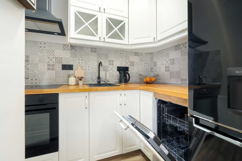 Contemporary kitchen with generous workspace, quality appliances and plenty of storage.