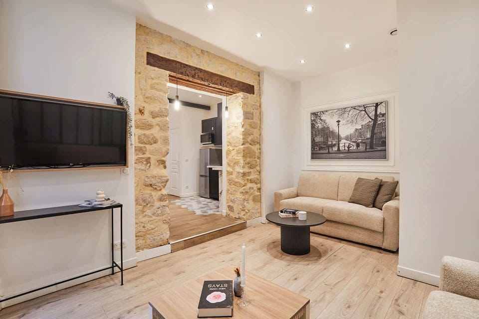 Salon avec 2 canapés lits