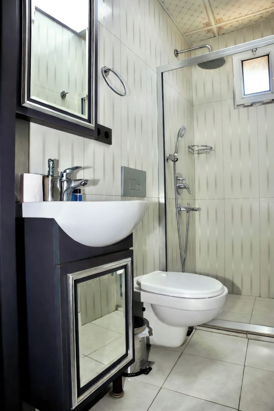 Eco-friendly toiletries, hair dryer, slippers, towels