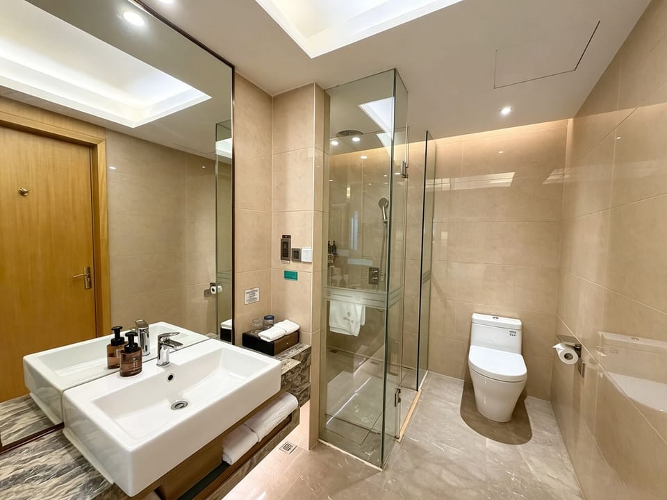 Hair dryer, slippers, towels, shampoo