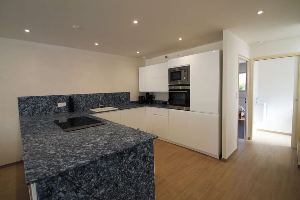 Granite Kitchen with Dishwasher, Hob, Microwave, Fan oven, Fridge Freezer
