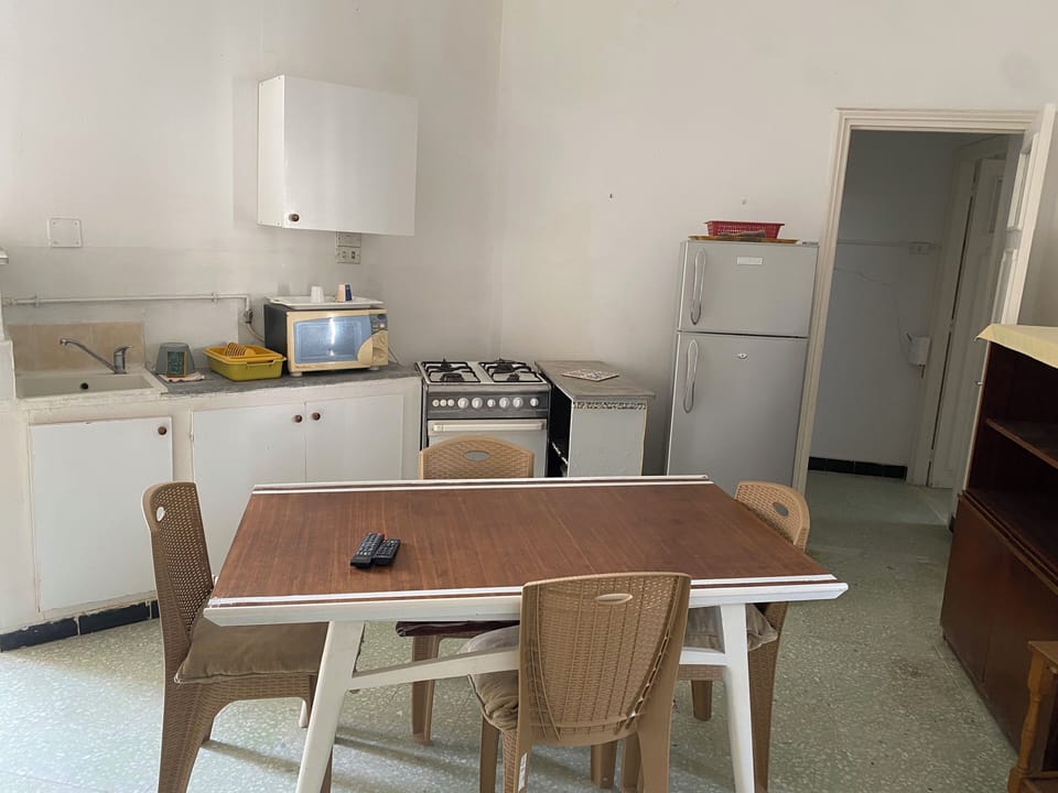 Apartment, Beach View, Beachfront | Private kitchen | Full-size fridge, microwave, cookware/dishes/utensils, cleaning supplies