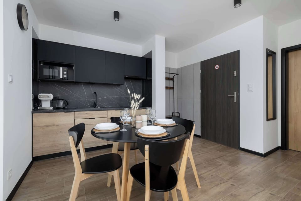 Cook and dine in style with the modern kitchenette and dining area.