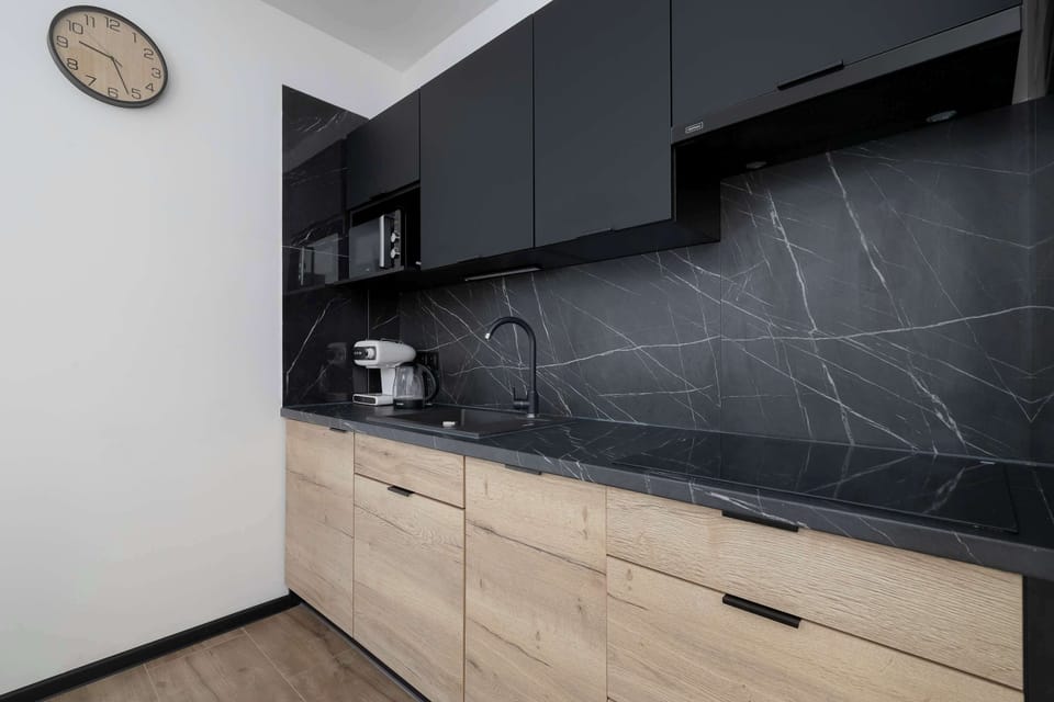 The kitchenette's practical layout maximizes space and functionality.
