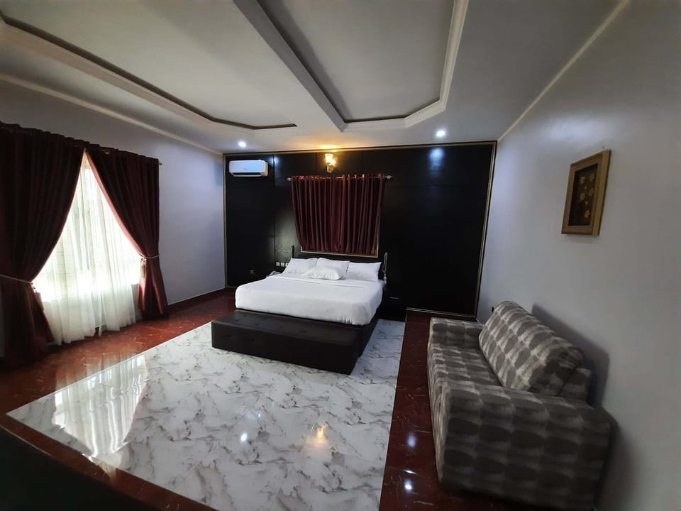 Family Room, Balcony, City View | Desk, laptop workspace, blackout drapes, soundproofing