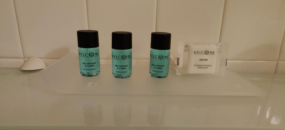 Shower, free toiletries, hair dryer, towels