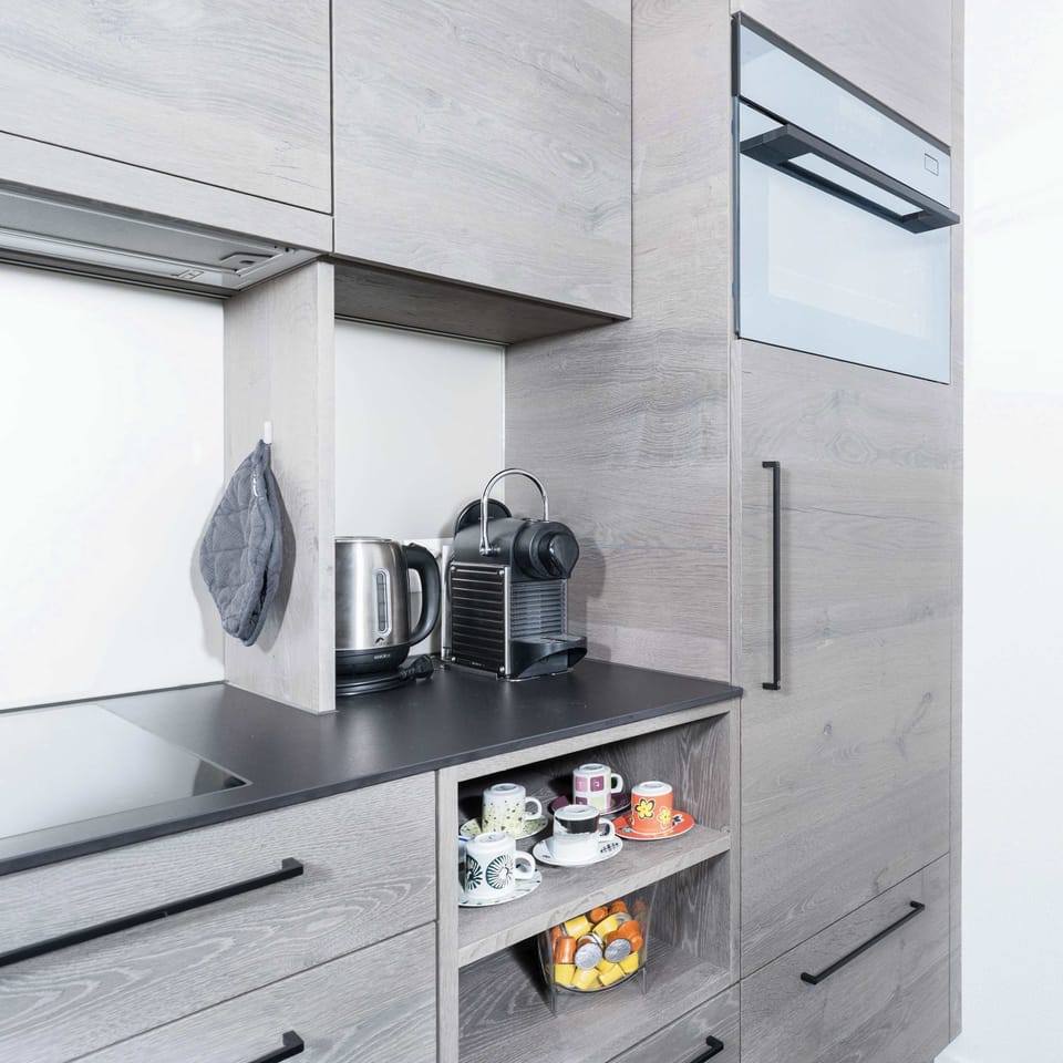 Modern kitchen with high-quality appliances and plenty of workspace.
