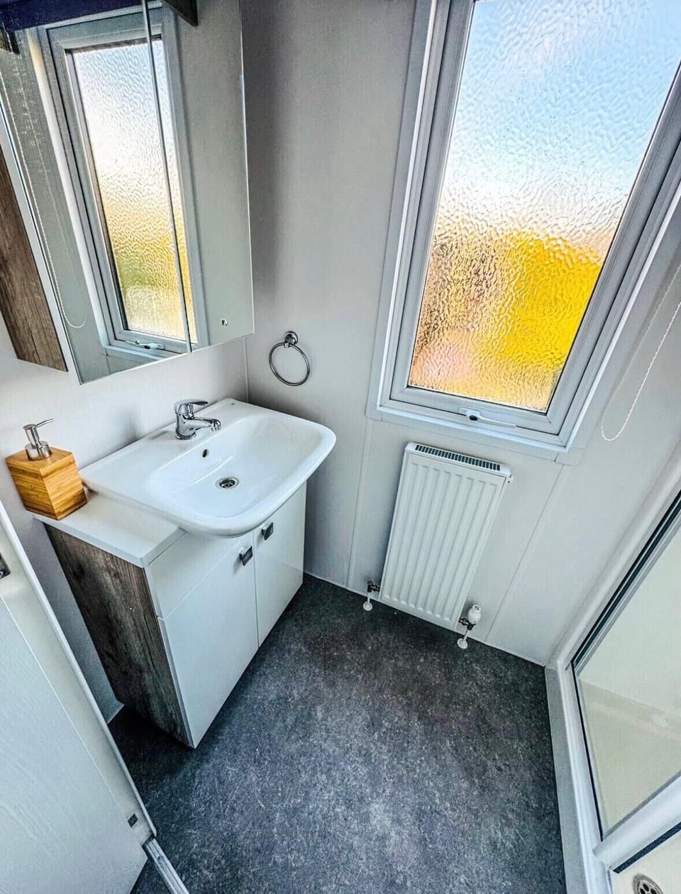 Modern bathroom with shower and washbasin