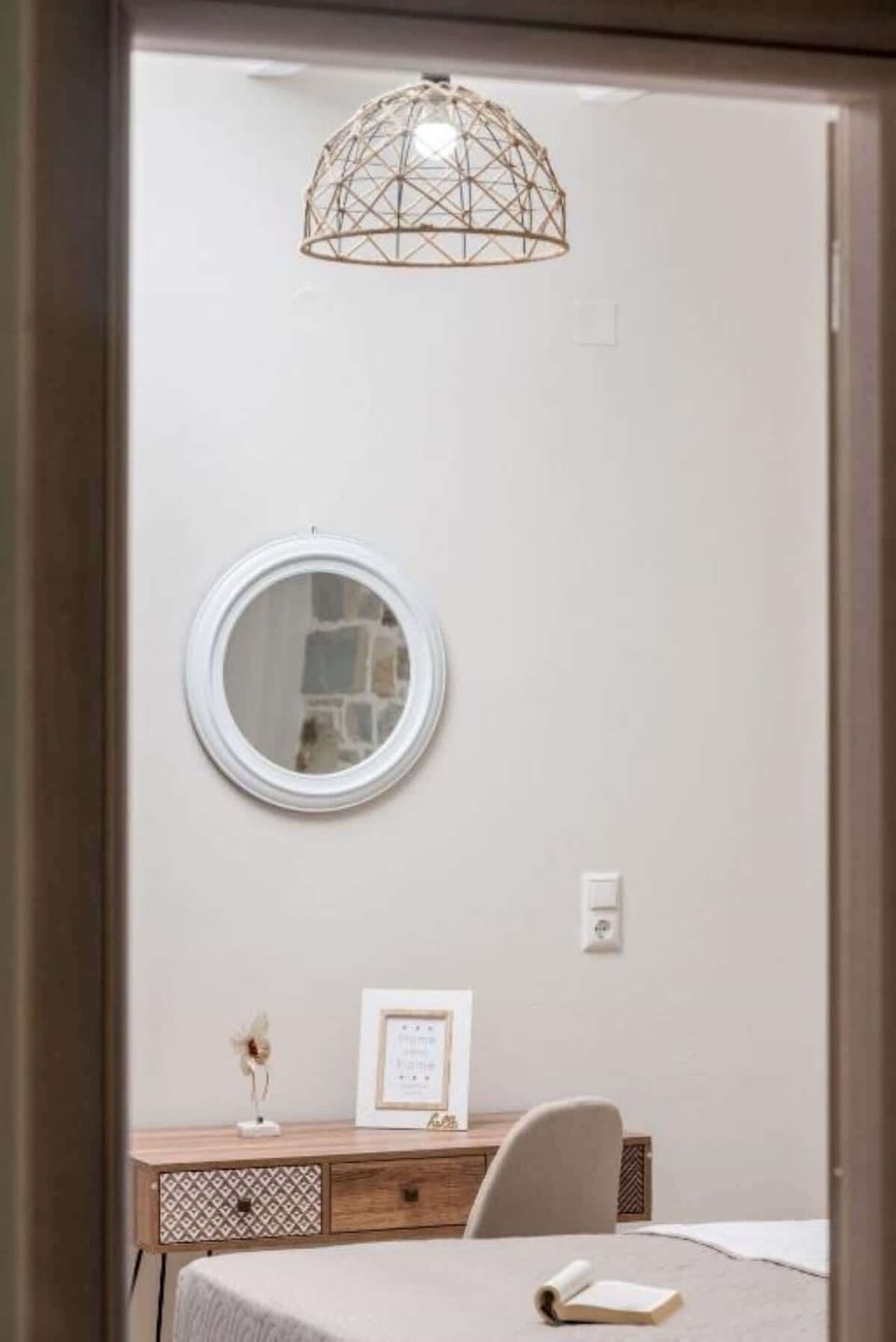 Bedroom entrance with mirror and convenient storage space