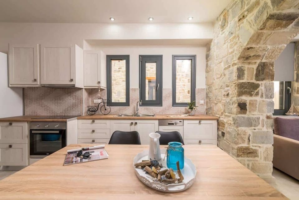 Fully equipped modern kitchen with everything needed for home-cooked meals.