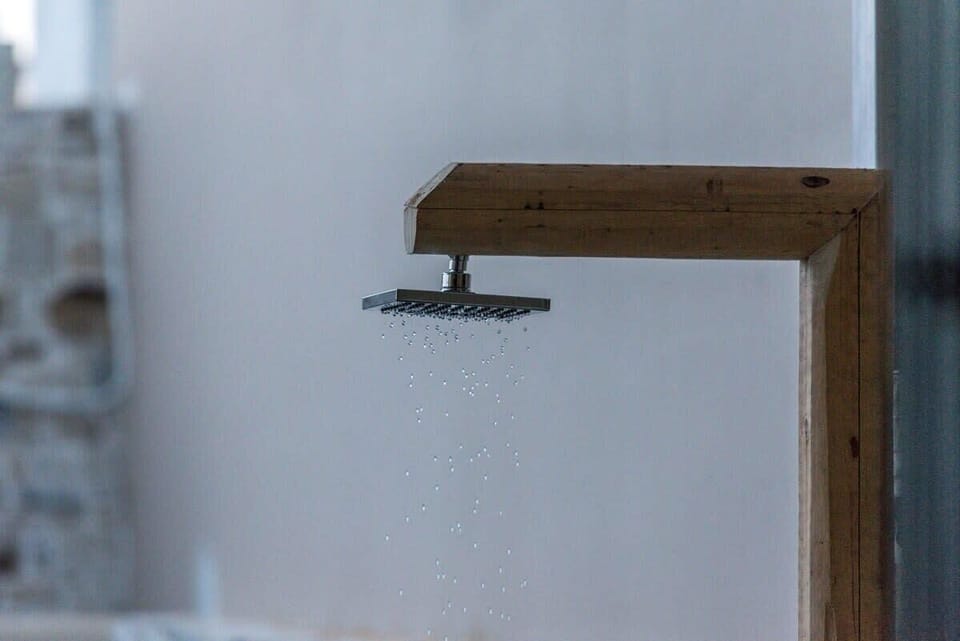 Outdoor shower—perfect for rinsing off after a swim or a beach day.