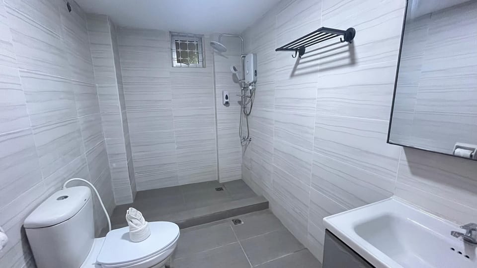 Family Triple Room, Balcony | Bathroom | Shower, slippers, towels, soap