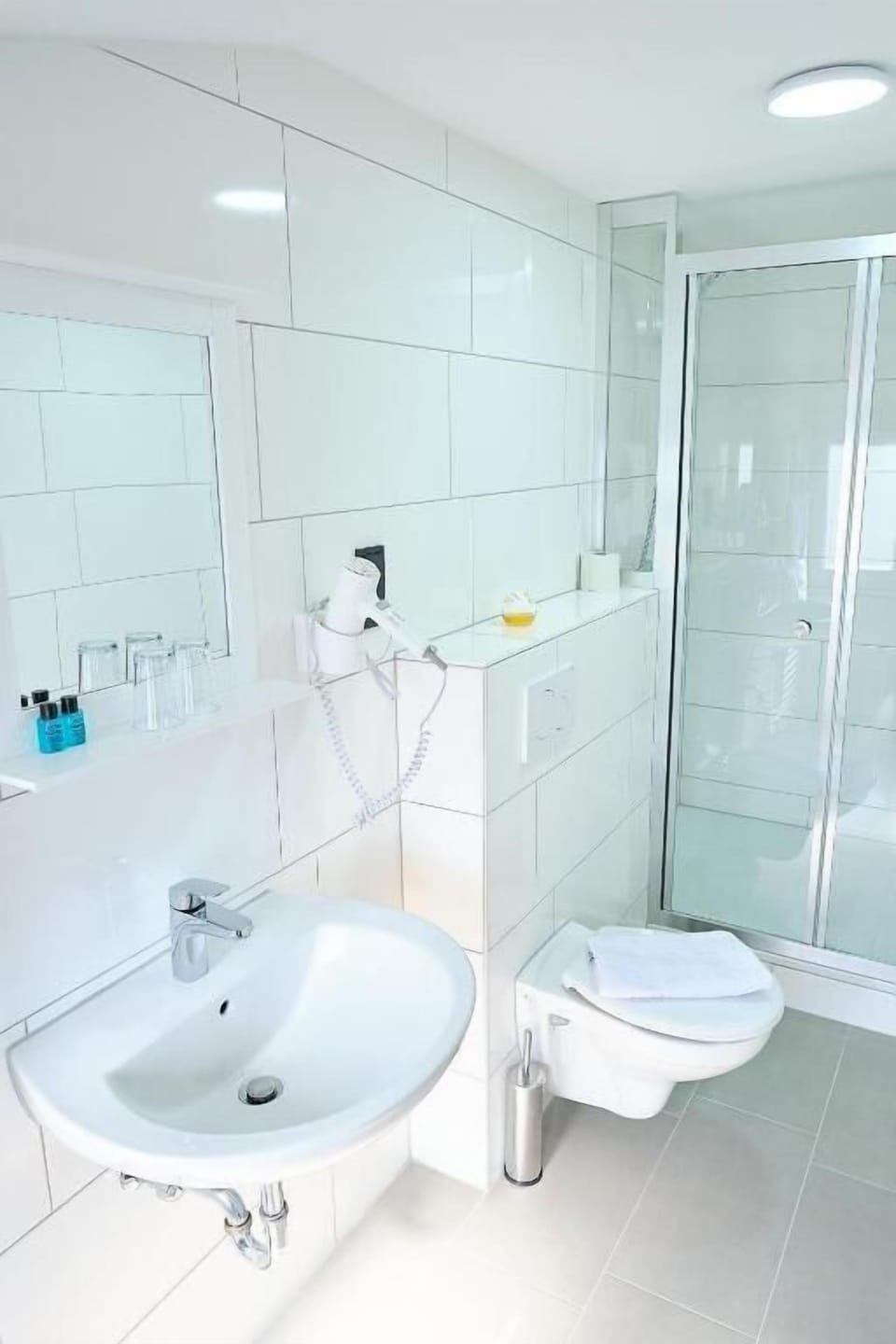 Free toiletries, hair dryer, slippers, towels