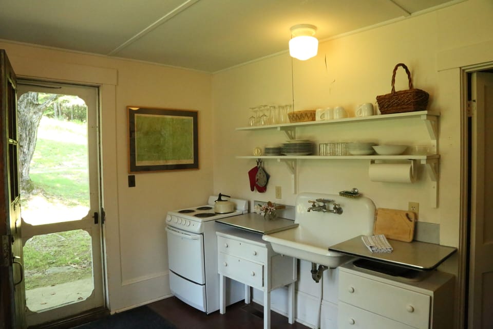 Charming vintage kitchen where simplicity meets comfort and Modern
