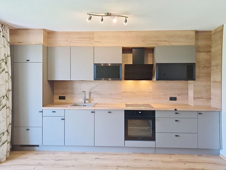 Cabinetry, Countertop, Flooring, Furniture, Wood, Kitchen, Interior Design, Kitchen Appliance, Floor, Cupboard