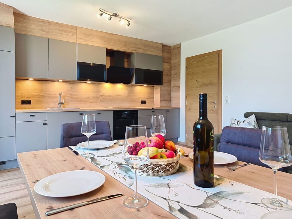 Furniture, Interior Design, Flooring, Countertop, Kitchen, Wood, Light Fixture, Ceiling, Floor, Kitchen & Dining Room Table