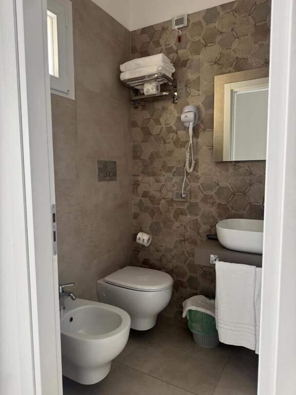 Family Quadruple Room, Balcony, City View | Bathroom | Shower, free toiletries, hair dryer, towels