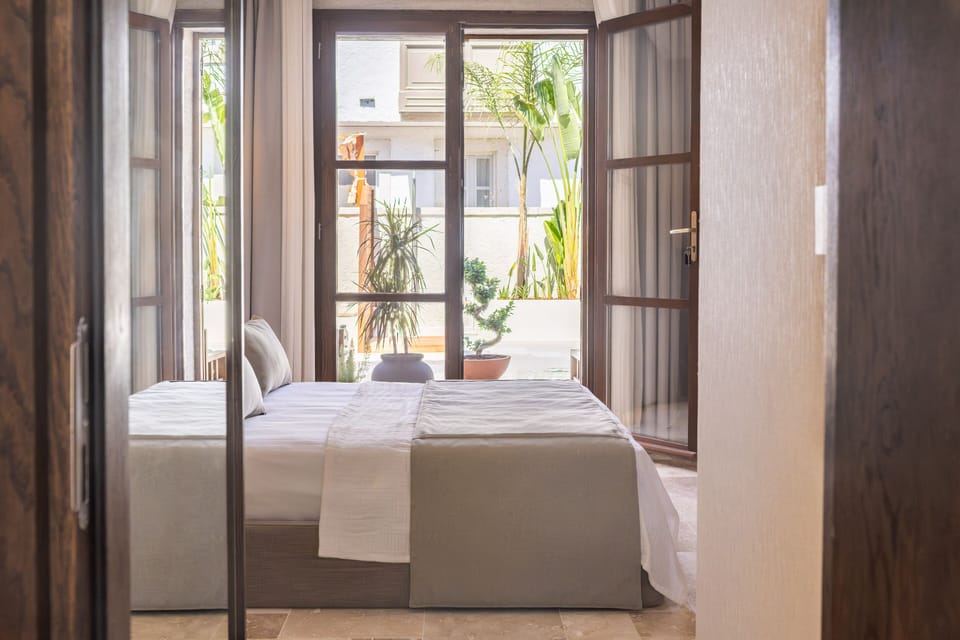 Deluxe Room, Pool View | Minibar, WiFi (free), individually furnished