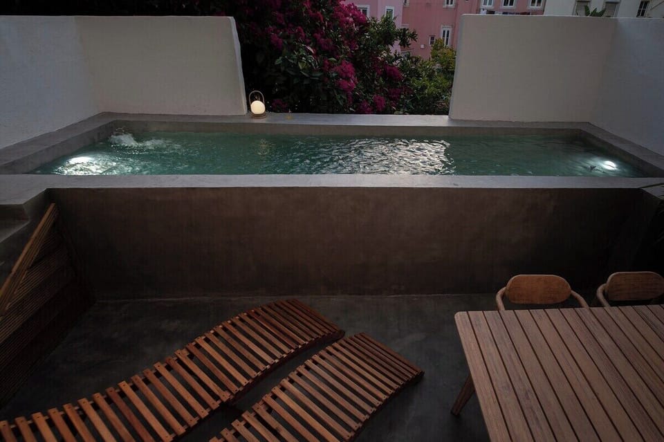 Terrace and swimming pool at night