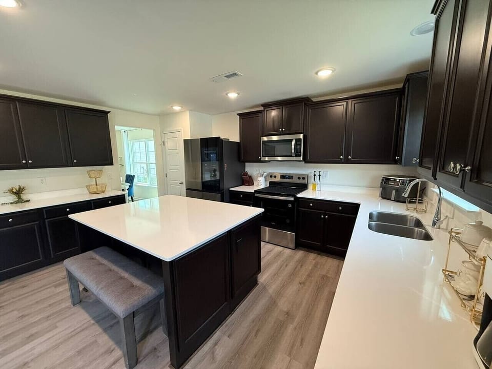 Spacious kitchen with bar seating