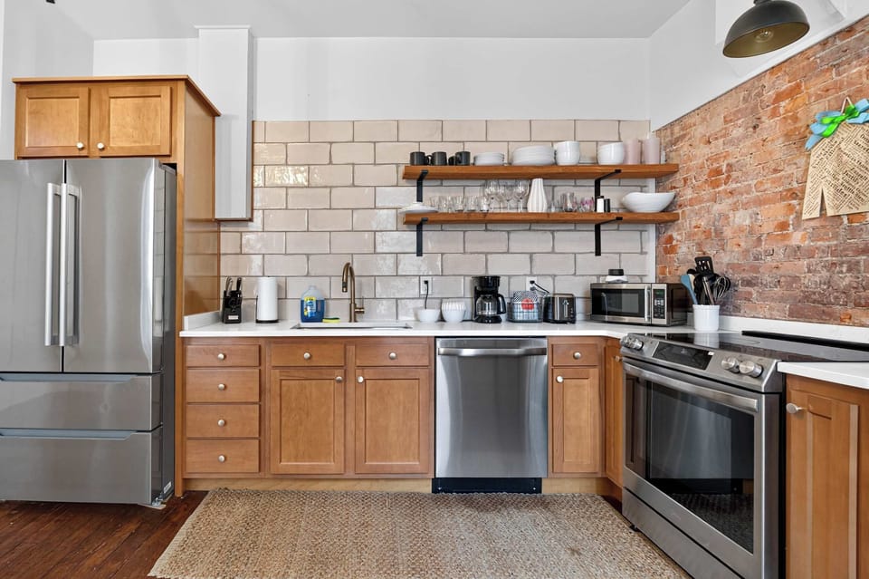 Kitchen: Make yourself at home in a spacious kitchen designed for easy meal prep, with modern appliances, useful cookware, and plenty of space for cooking and gathering.