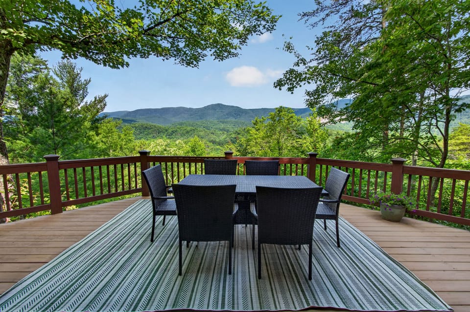 Scenic mountain-view deck with outdoor dining for six
